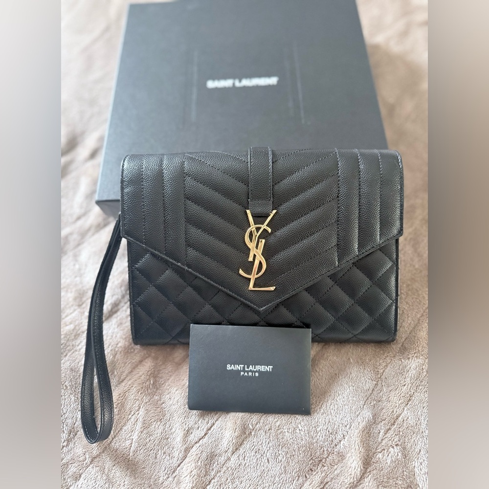 Yves Saint Laurent Quilted Black Clutch with Gold Emblem